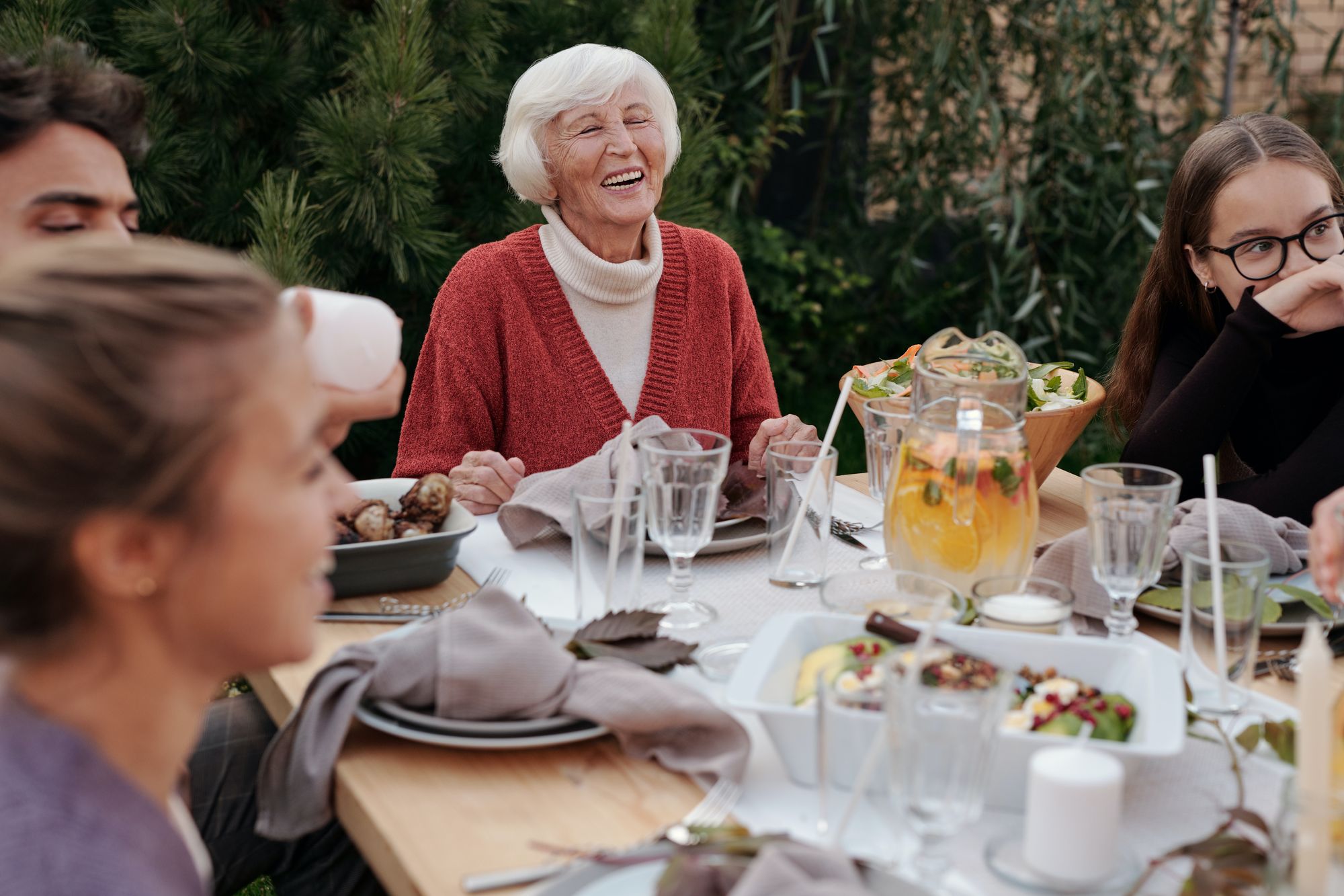 A happy elderly couple sitting comfortably in their home, embracing the concept of age in place