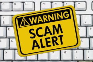 SCAM ALERT: Caregiver Social Isolation, Vulnerability and Social Media Interaction